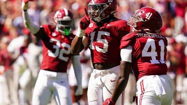 Oct 14, 2023; Tuscaloosa, Alabama, USA; Alabama Crimson Tide linebacker Dallas Turner (15) reacts after holding Arkansas Razorbacks to a loss of yardage during the fourth quarter at Bryant-Denny Stadium.